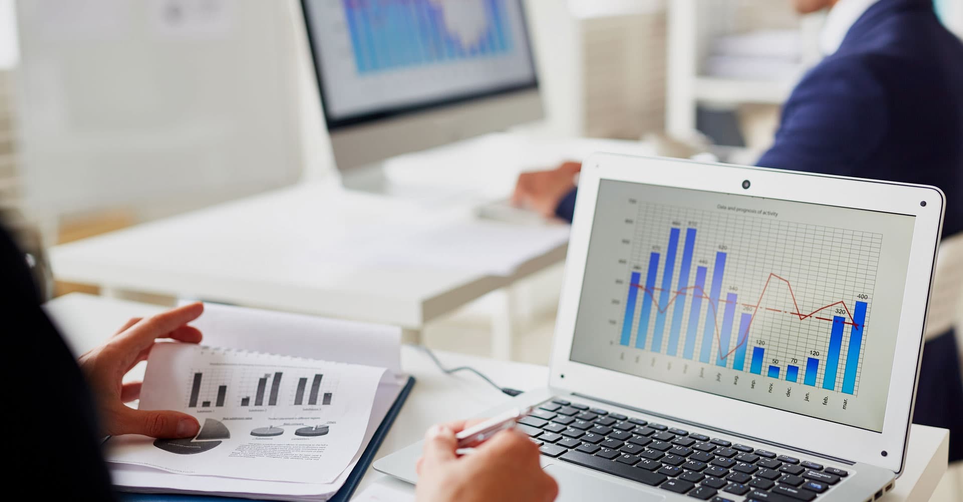 Businesspeople reviewing documents
